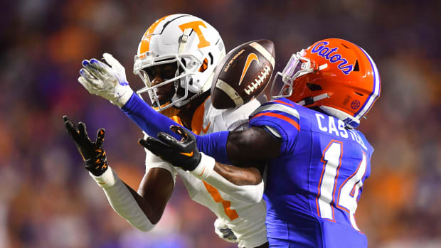 Florida safety Jordan Castell (14) breaks up a pass in tended for Tennessee wide receiver Dont'e Thornton Jr. (1) during the NCAA football game between Tennessee and Florida at Ben Hill Griffin Stadium in Gainesville, Fla., on Saturday, Sept. 16, 2023.  